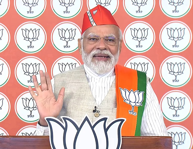 Prime Minister and senior BJP leader Narendra Modi speaks during an interaction with party workers from Karnataka ahead of the Karnataka Assembly polls, via a video conference, on Thursday. (UNI) Prime Minister and senior BJP leader Narendra Modi speaks during an interaction with party workers from Karnataka ahead of the Karnataka Assembly polls, via a video conference, on Thursday. (UNI)