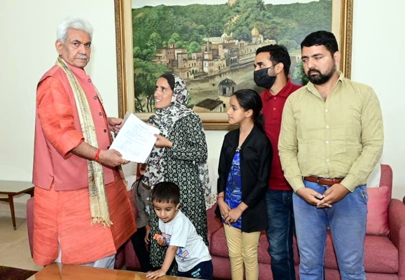 LG Manoj Sinha handing over appointment letter. LG Manoj Sinha handing over appointment letter.