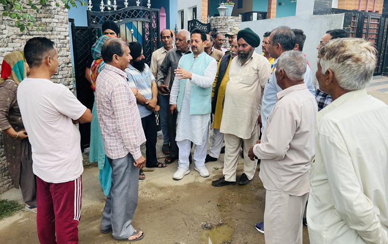Deputy Mayor, Jammu, Baldev Singh Billawaria interacting with residents of Bhor Camp during visit to the area on Sunday. Deputy Mayor, Jammu, Baldev Singh Billawaria interacting with residents of Bhor Camp during visit to the area on Sunday.