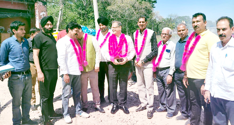 BJP senior leader and former Dy CM, Kavinder Gupta kick starting blacktopping of road at Satwari on Friday. BJP senior leader and former Dy CM, Kavinder Gupta kick starting blacktopping of road at Satwari on Friday.