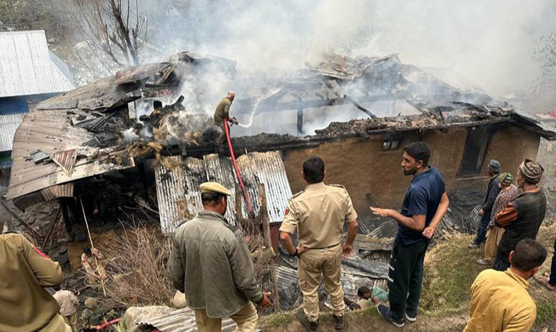 A house on fire in Mandi area of Poonch on Sunday.—Excelsior/Waseem