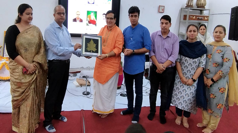 Eminent Mridangam player from Andhra Pradesh, Peravali Jaya Bhaskar being honoured at MAM College Jammu on Thursday.
