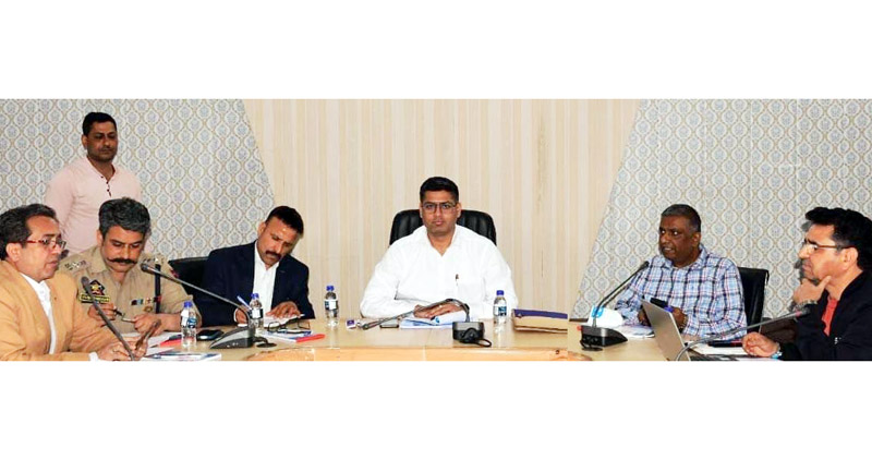 DC Rajouri chairing a meeting.