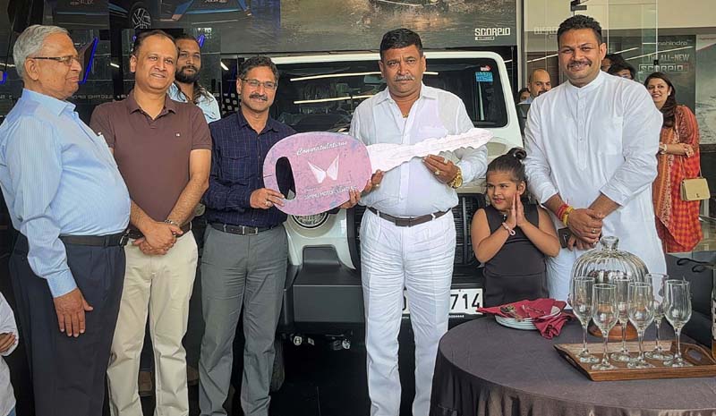 RTO Jammu, Pankaj Bhagotra along with other dignitaries delivers the THAR & Scorpio S11 to its customers. RTO Jammu, Pankaj Bhagotra along with other dignitaries delivers the THAR & Scorpio S11 to its customers.