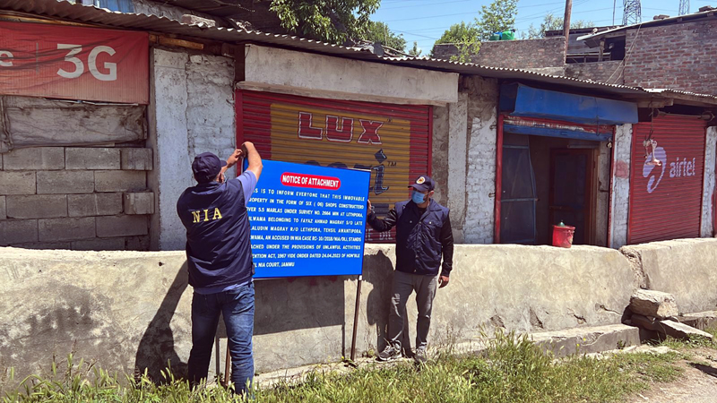 NIA attaching property at Lethpora, Awantipora on Wednesday. -Excelsior/Younis Khaliq NIA attaching property at Lethpora, Awantipora on Wednesday. -Excelsior/Younis Khaliq