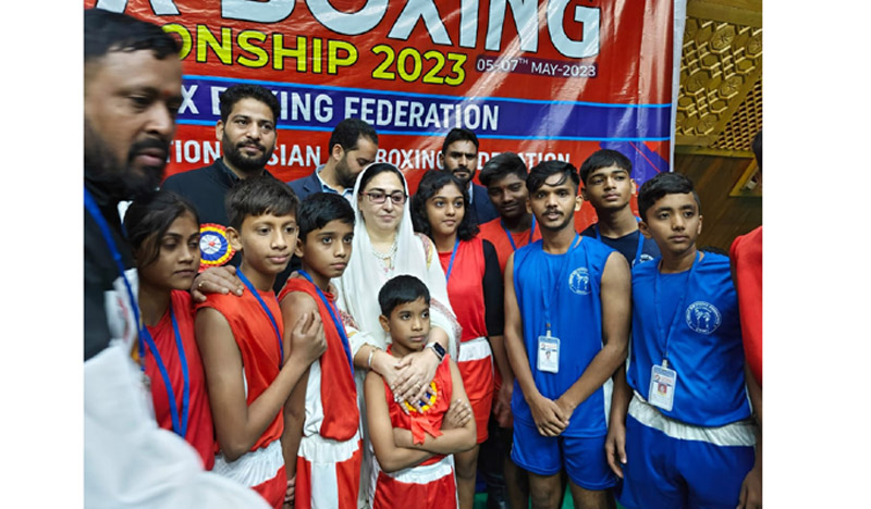 Waqf Chairperson Dr Darakshan Andrabi posing with boxers at Srinagar on Saturday. Waqf Chairperson Dr Darakshan Andrabi posing with boxers at Srinagar on Saturday.