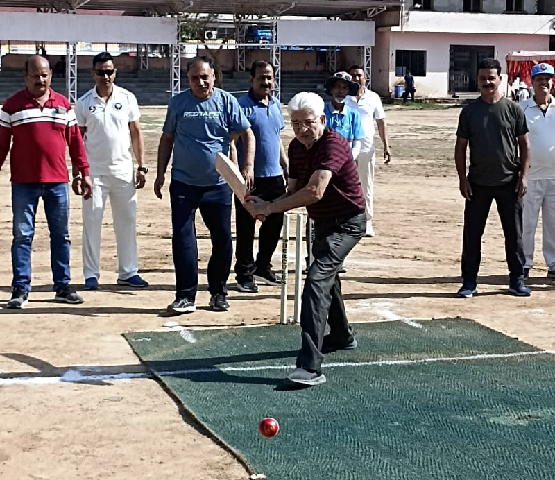 A veteran cricketer of J&K testing his batting skills while inaugurating RKGM Veteran T-20 Cricket Tournament at Parade Ground, Jammu. A veteran cricketer of J&K testing his batting skills while inaugurating RKGM Veteran T-20 Cricket Tournament at Parade Ground, Jammu.