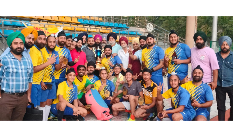 Winners being awarded with the trophy by dignitaries at Jammu on Saturday. Winners being awarded with the trophy by dignitaries at Jammu on Saturday.