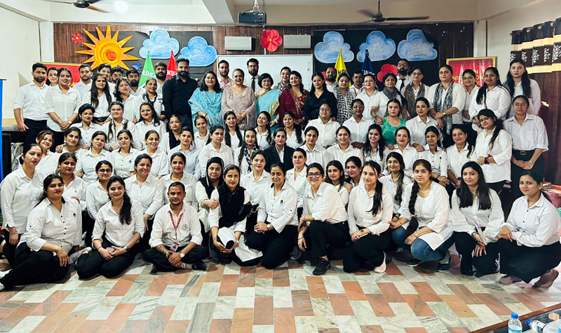 Guests and faculty members of DIS Jammu posing together during a programme.