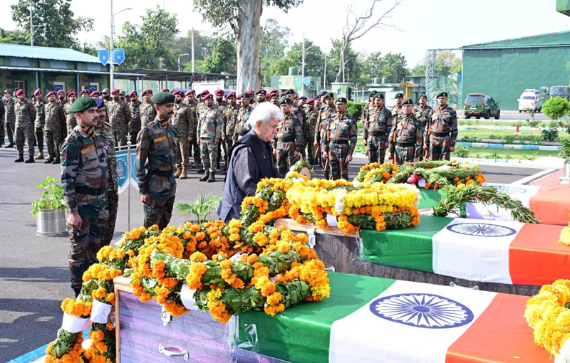 LG Manoj Sinha paying tribute to the soldiers martyred in ongoing operations against terrorists in Rajouri on Saturday.
