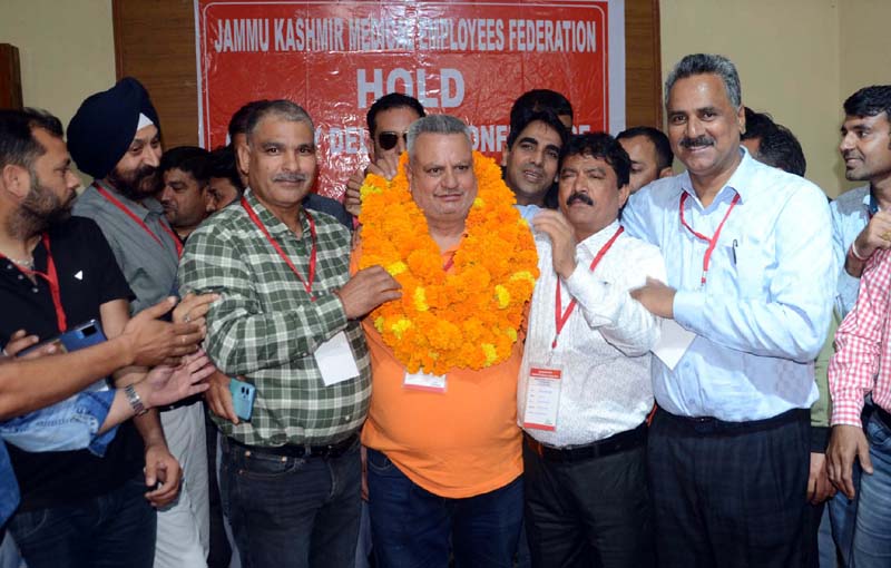 Sushil Sudhan being garlanded by delegates on his re-election as president of the new body of JKMEF in Jammu.-Excelsior/Rakesh Sushil Sudhan being garlanded by delegates on his re-election as president of the new body of JKMEF in Jammu. -Excelsior/Rakesh