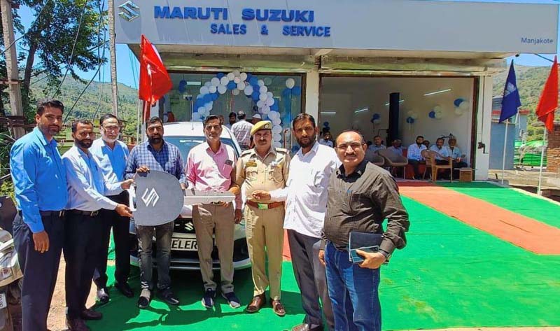 Customer being handed over key of Celerio Vehicle at newly opened Jamkash Vehicleades MSSSP at Manjakote. Customer being handed over key of Celerio Vehicle at newly opened Jamkash Vehicleades MSSSP at Manjakote.