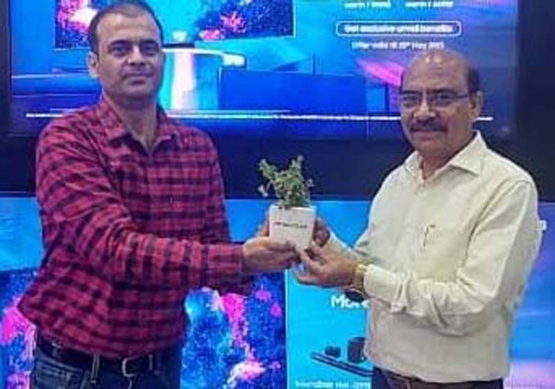 Proprietor of RK Video Jammu Vijay Sharma along with a Samsung official at the former’s store in Jammu. Proprietor of RK Video Jammu Vijay Sharma along with a Samsung official at the former’s store in Jammu.