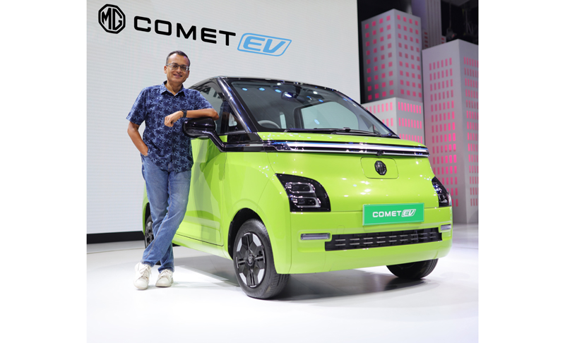 Deputy MD, MG Motor India, Gaurav Gupta posing with one of the newly launched variants of Comet EV.
