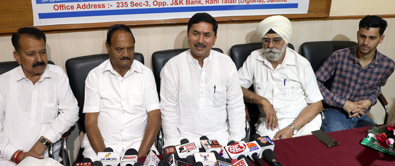 J&K Dairy Farmers Association office bearers addressing a press conference at Jammu on Wednesday. J&K Dairy Farmers Association office bearers addressing a press conference at Jammu on Wednesday.