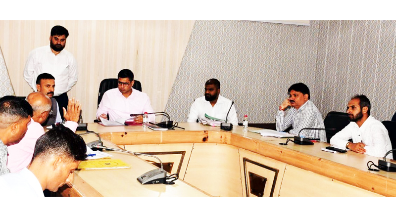 DC Rajouri Vikas Kundal chairing a meeting of revenue and Army officials on Thursday.