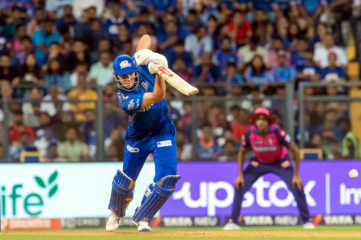 Tim David in action during his unbeaten knock of 45 runs against Rajasthan Royals at Mumbai on Sunday. Tim David in action during his unbeaten knock of 45 runs against Rajasthan Royals at Mumbai on Sunday.