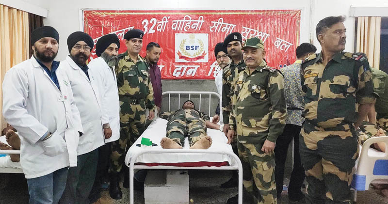 BSF jawans donating blood during a camp at Mandi in district Poonch on Friday. —Excelsior/ Waseem