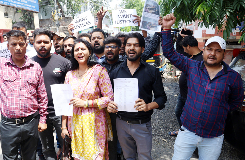 CSC vendors staging protest on Monday. — Excelsior/Rakesh CSC vendors staging protest on Monday. — Excelsior/Rakesh