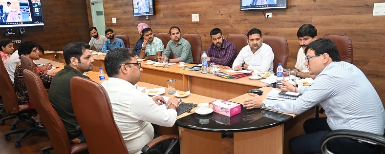 Director Informatin & Public Relations chairing a meeting at Jammu