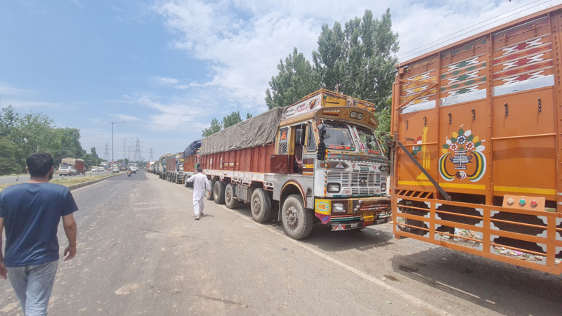Trucks stranded on the National Highway at Qazigund for last 15 days. — Excelsior/Sajad Dar Trucks stranded on the National Highway at Qazigund for last 15 days. — Excelsior/Sajad Dar