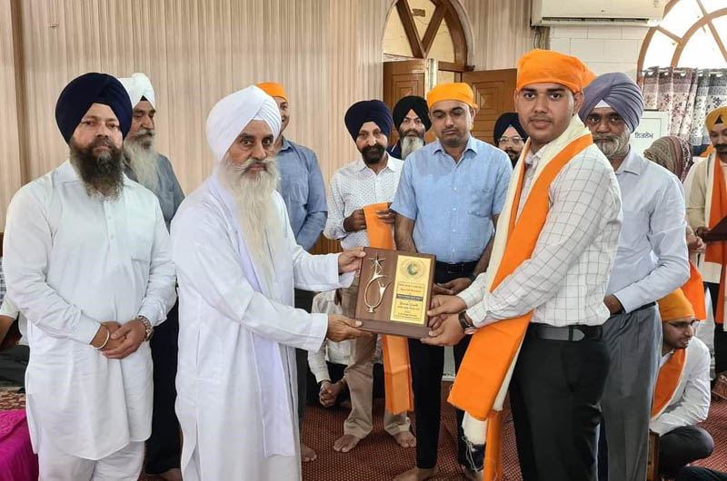 Chairman, AJKSCC, Ajit Singh and Mahant Manjit Singh, Chief of Shiromani Dera Nangali Sahib felicitating successful UPSC candidates in Jammu on Sunday. Chairman, AJKSCC, Ajit Singh and Mahant Manjit Singh, Chief of Shiromani Dera Nangali Sahib felicitating successful UPSC candidates in Jammu on Sunday.