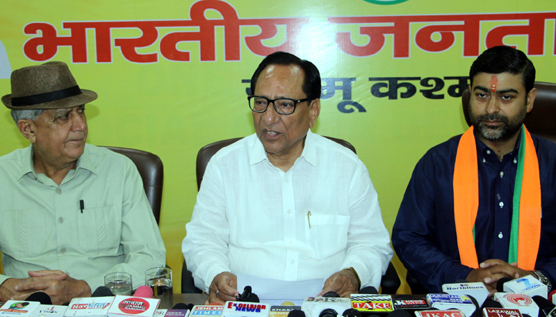 BJP spokesman Y V Sharma addressing a press conference at Jammu along with party leaders Dr Pardeep Mahotra and Mukherjee Sharma on Saturday. BJP spokesman Y V Sharma addressing a press conference at Jammu along with party leaders Dr Pardeep Mahotra and Mukherjee Sharma on Saturday.