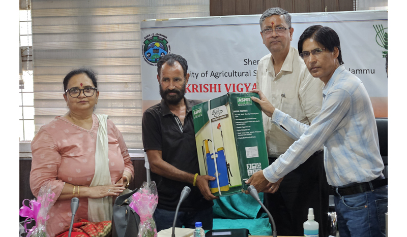 SKUAST-J Vice-Chancellor distributing Napsack sprayers to farmers during visit to KVK Reasi on Sunday. SKUAST-J Vice-Chancellor distributing Napsack sprayers to farmers during visit to KVK Reasi on Sunday.