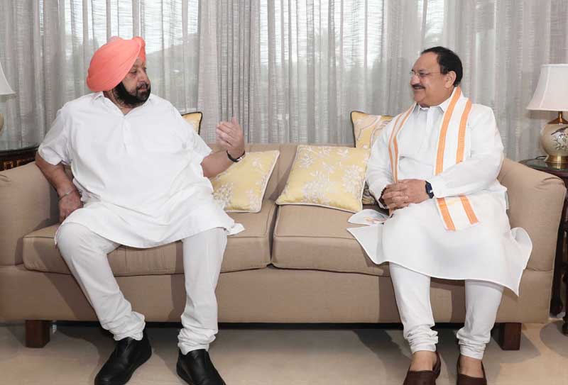 BJP National President J P Nadda meeting senior leader and former Punjab Chief Minister Capt Amarinder Singh, in Mohali on Thursday. (UNI) BJP National President J P Nadda meeting senior leader and former Punjab Chief Minister Capt Amarinder Singh, in Mohali on Thursday. (UNI)