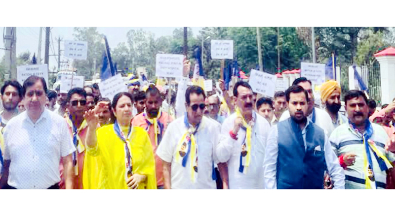 DPAP leaders and activists during protest demonstration at Reasi on Saturday. DPAP leaders and activists during protest demonstration at Reasi on Saturday.