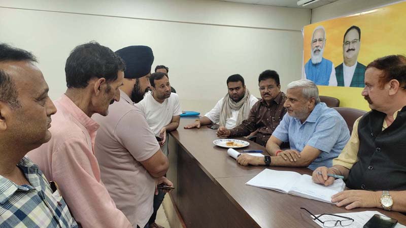 Sham Lal Sharma & others listening public grievances at BJP office on Thursday. Sham Lal Sharma & others listening public grievances at BJP office on Thursday.