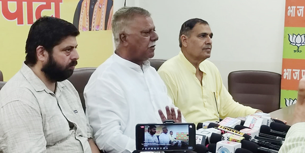 Former Minister Sukhnandan Choudhary addressing a press conference at Jammu on Tuesday. Former Minister Sukhnandan Choudhary addressing a press conference at Jammu on Tuesday.