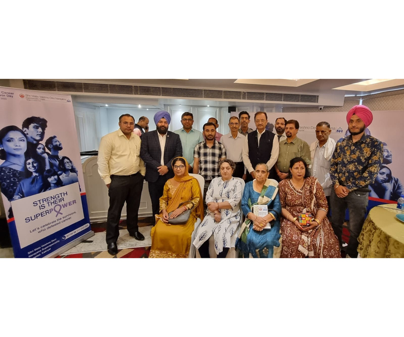 Oncologists of SMVD Narayana Hospital posing with cancer survivors during a meet at Jammu. Oncologists of SMVD Narayana Hospital posing with cancer survivors during a meet at Jammu.