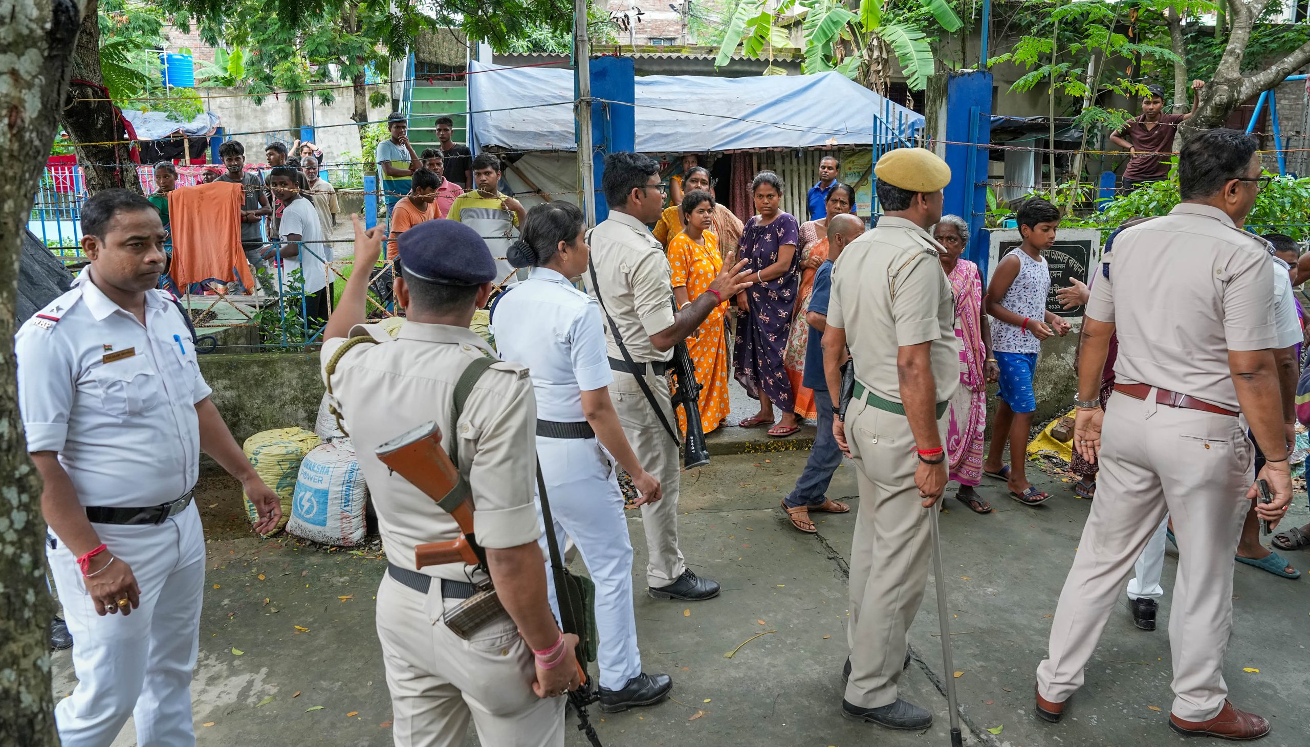 WB Panchayat polls: Voting in North 24 Parganas Security people arrive to intervene after tension between two political groups during panchayat elections in North 24 Pargana district of West Bengal