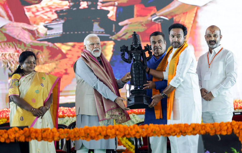 Prime Minister Narendra Modi laying foundation stone of various projects in Warangal, in Telangana on Saturday. (UNI)