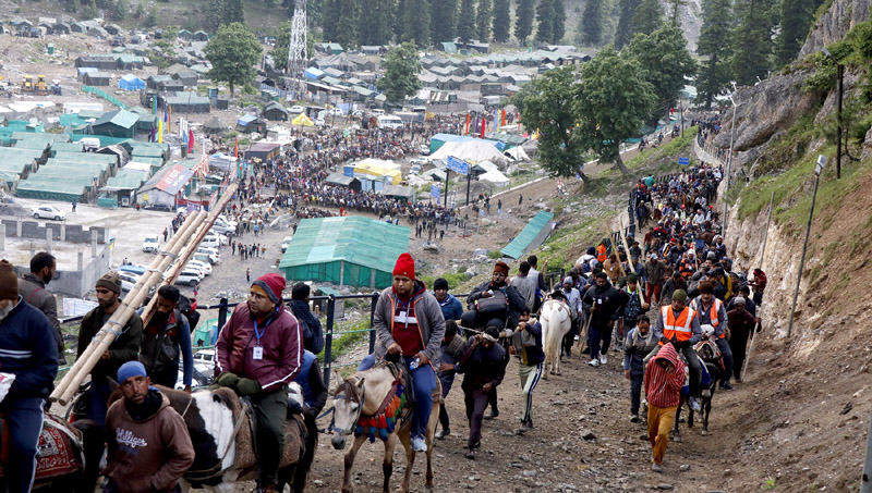 First batch of Amarnath pilgrims heading towards the holy cave from Baltal base camp on Saturday morning. Another pic on page 4. - Excelsior/Shakeel First batch of Amarnath pilgrims heading towards the holy cave from Baltal base camp on Saturday morning. Another pic on page 4. - Excelsior/Shakeel