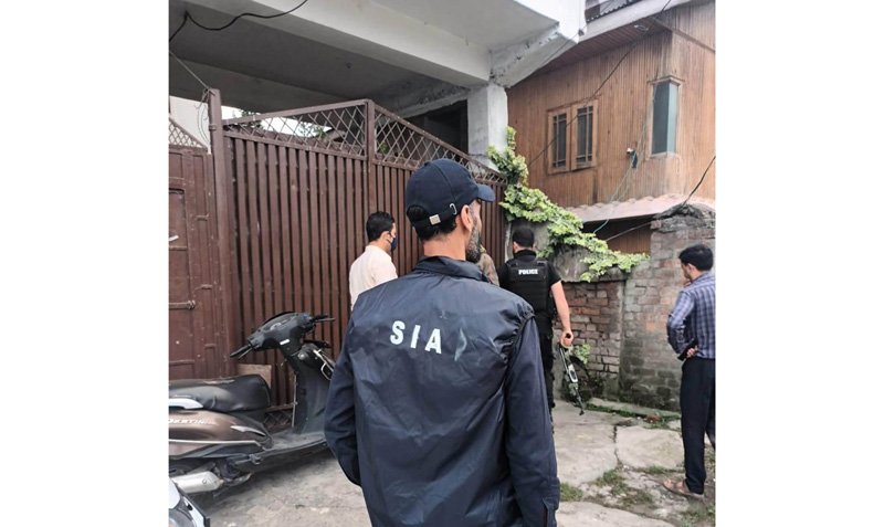 The State Investigation Agency (SIA) Kashmir during raids at South Kashmir’s Anantnag district on Tuesday. -Excelsior/Sajad Dar The State Investigation Agency (SIA) Kashmir during raids at South Kashmir’s Anantnag district on Tuesday. -Excelsior/Sajad Dar