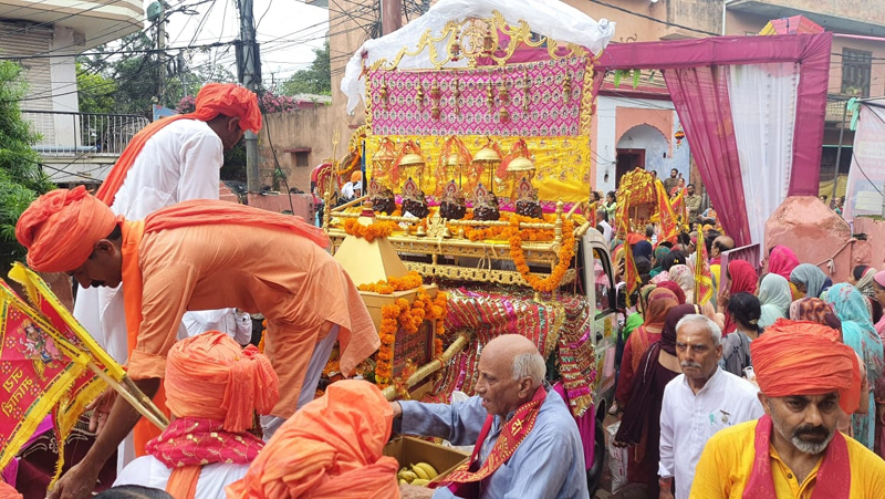 Devotees and Adhi Shakti Sewa Sanstha taking out Pingla Mata Shobha Yatra at Udhampur on Saturday. Devotees and Adhi Shakti Sewa Sanstha taking out Pingla Mata Shobha Yatra at Udhampur on Saturday.