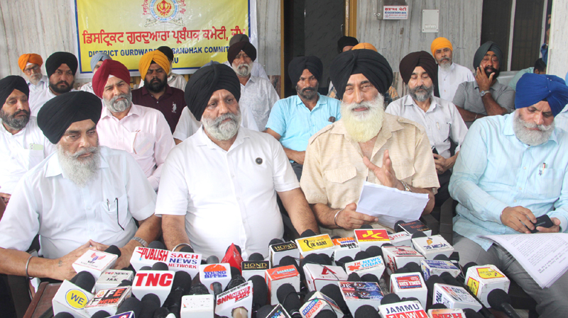 DGPC president RS Tohra and vice president Balvinder Singh addressing a press conference in Jammu. -Excelsior/Rakesh DGPC president RS Tohra and vice president Balvinder Singh addressing a press conference in Jammu. -Excelsior/Rakesh