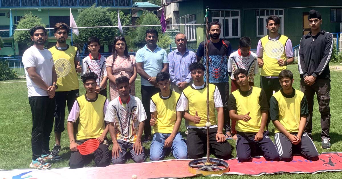 Players posing with trainers during a speed ball training camp in Srinagar on Sunday. Players posing with trainers during a speed ball training camp in Srinagar on Sunday.
