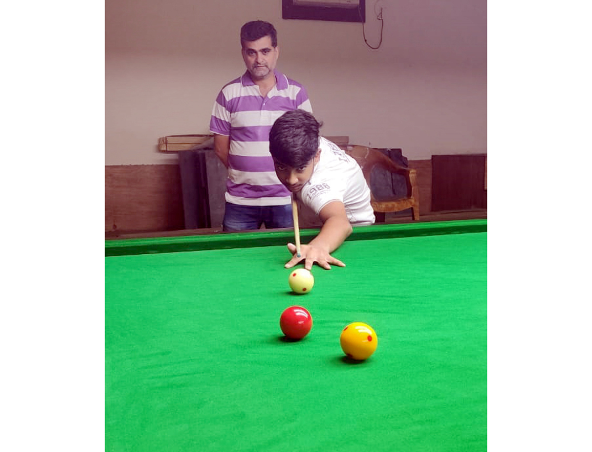 Hardik Gupta, sub-junior Billiards Champion aiming at target during 28th Jammu District Billiards and Snooker Championship at Jammu. Hardik Gupta, sub-junior Billiards Champion aiming at target during 28th Jammu District Billiards and Snooker Championship at Jammu.