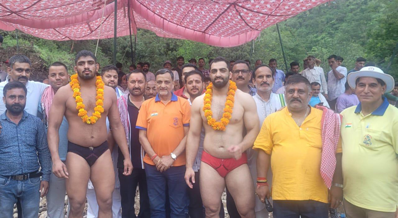 Winner and runners-up wrestlers of 1st International Kun Dorian-Arli (Katra) Dangal posing with dignitaries. Winner and runners-up wrestlers of 1st International Kun Dorian-Arli (Katra) Dangal posing with dignitaries.