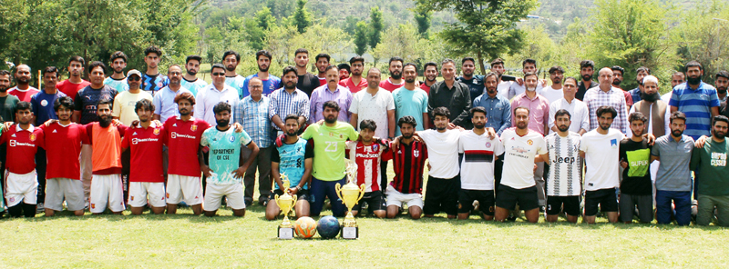Inter-departmental Football teams along with dignitaries posing for a group photograph during football tournament at Islamic University of Science and Technology (IUST), Awantipora. Inter-departmental Football teams along with dignitaries posing for a group photograph during football tournament at Islamic University of Science and Technology (IUST), Awantipora.