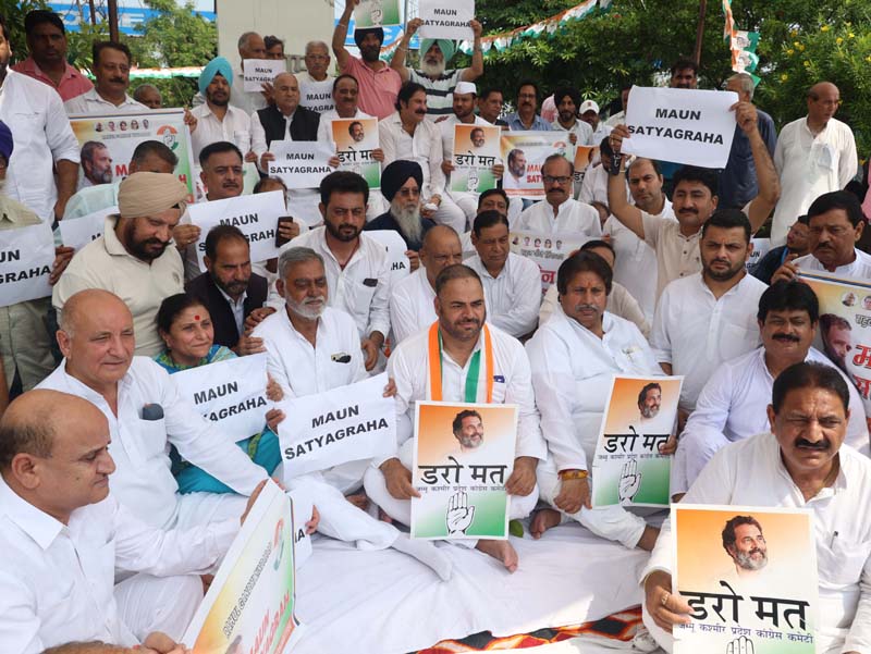 Cong leaders and workers staging silent protest at Satwari in Jammu on Wednesday. -Excelsior/Rakesh Cong leaders and workers staging silent protest at Satwari in Jammu on Wednesday. -Excelsior/Rakesh