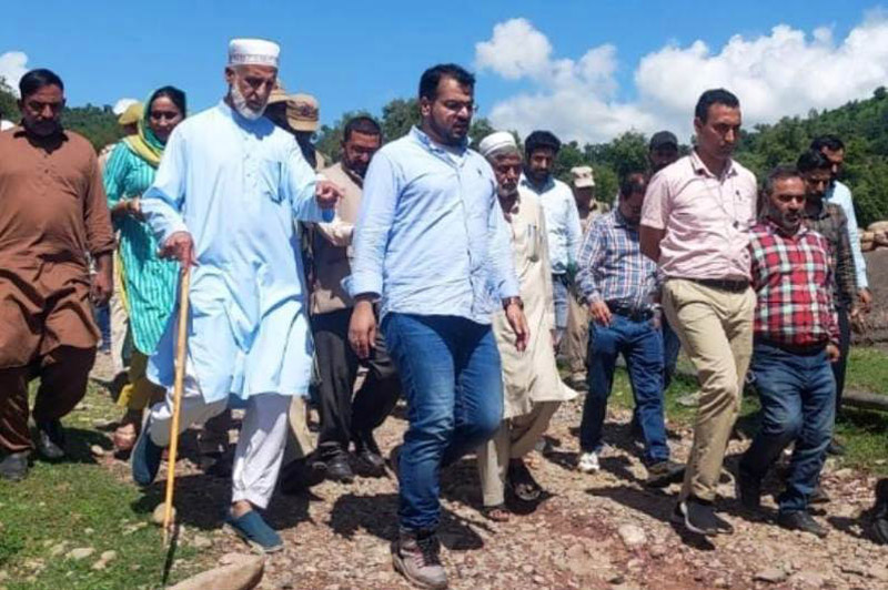 DC Poonch visiting landslide hit village Dhundak on Monday. DC Poonch visiting landslide hit village Dhundak on Monday.