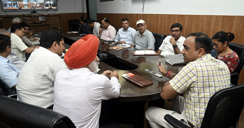 Div Com Jammu chairing a meeting. Div Com Jammu chairing a meeting.