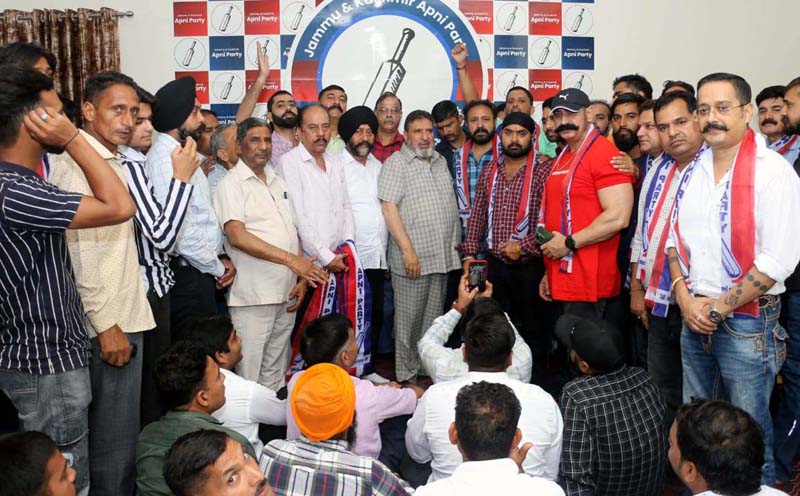 Altaf Bukhari with senior leaders of Apni Party and new entrants in the party at Gandhi Nagar on Wednesday. Altaf Bukhari with senior leaders of Apni Party and new entrants in the party at Gandhi Nagar on Wednesday.