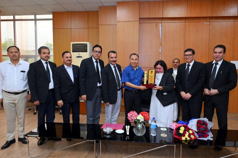 Justice Tashi Rabstan being presented memento by Judicial Officers at Jammu. Justice Tashi Rabstan being presented memento by Judicial Officers at Jammu.