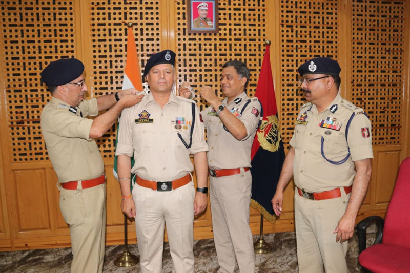 A police officer being decorated with the rank of DySP in presence of DGP Dilbag Singh on Thursday. A police officer being decorated with the rank of DySP in presence of DGP Dilbag Singh on Thursday.