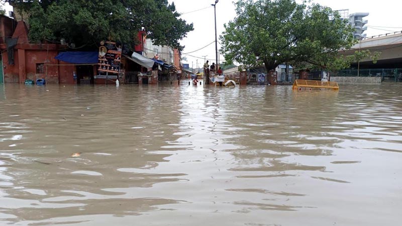 A view of flooded road in New Delhi on Thursday. (UNI)